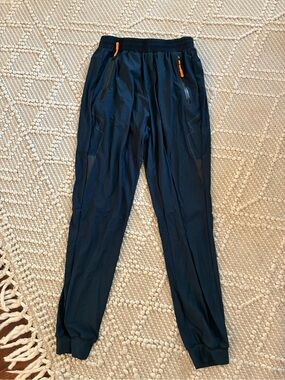 Women's Dark Blue Track Joggers with Orange Zip Pulls